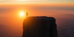 Person ready to leap into the unknown at sunrise.